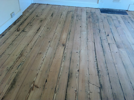 Pitch Pine Wooden Floorboards Restored in North Wales by Woodfloor-Renovations