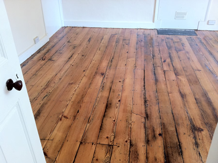 Sanding and Sealing of Old Pine Floorboards in North Wales by Woodfloor-Renovations