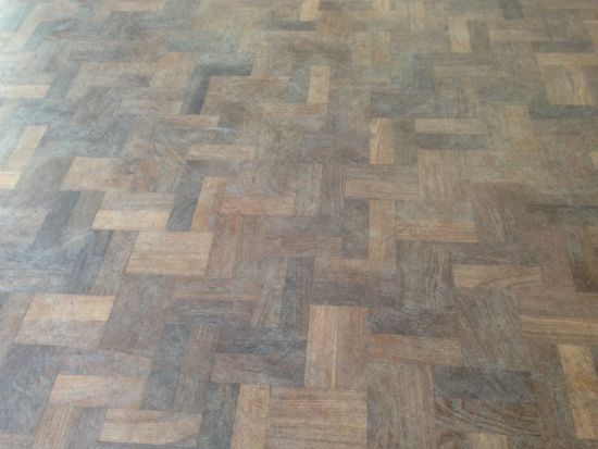 Close up of the Walnut Parquet Floor at Dewi Sant Primary School Rhyl