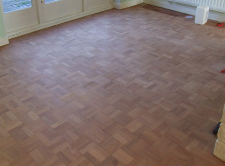 Lacquer being applied to Mosaic Parquet