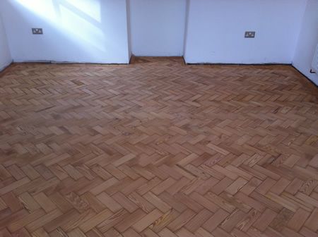 Pitch Pine Parquet Restoration in North Wales by Woodfloor-Renovations