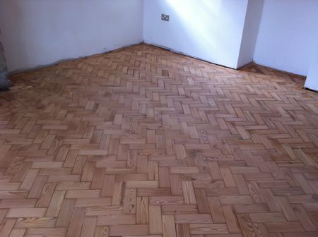 Pitch Pine Parquet Flooring Restoration in North Wales by Woodfloor-Renovations